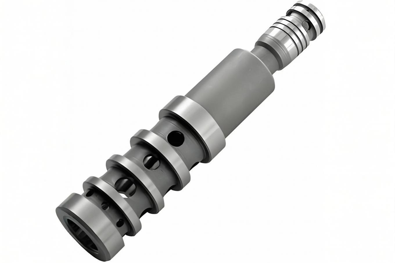 Hydraulic valve spool showing precision machined lands and grooves