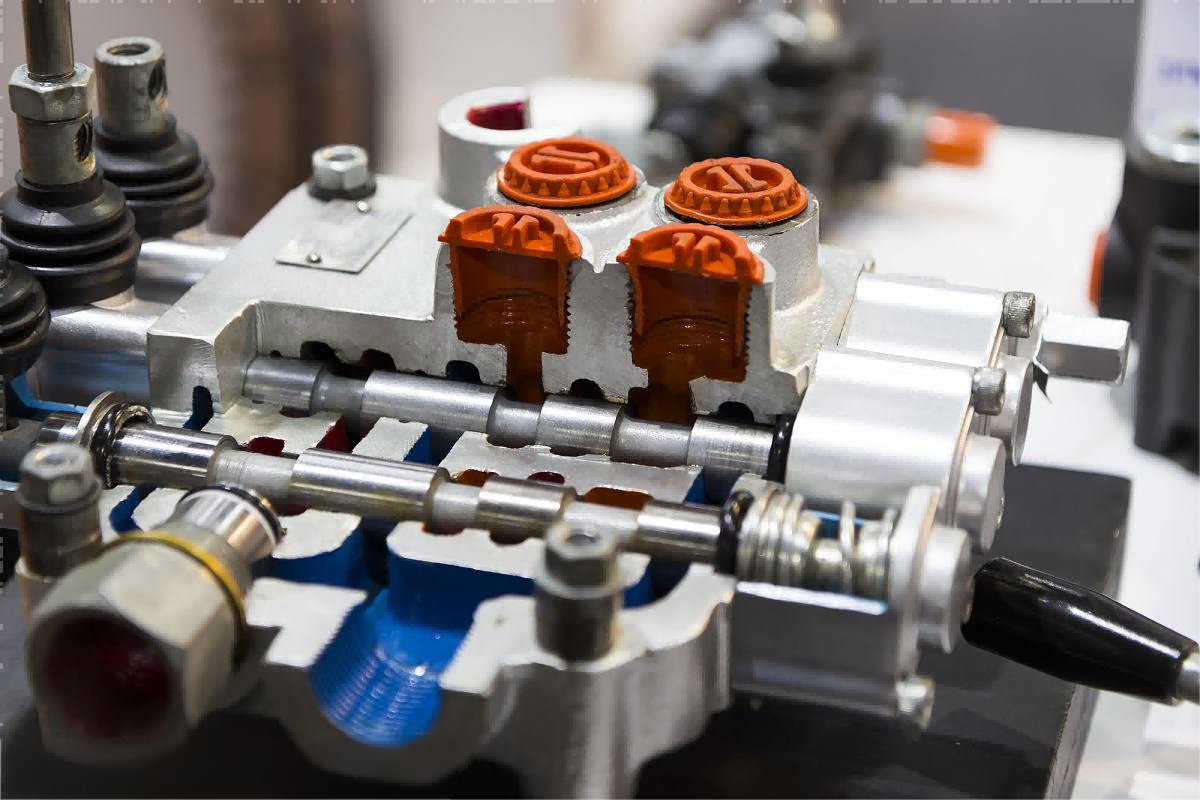 Cutaway view of a hydraulic valve showing internal components and fluid flow paths
