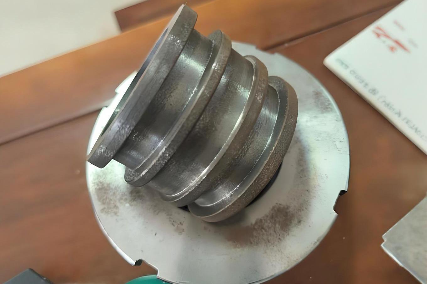 Hydraulic cylinder piston with installed seals and wear rings