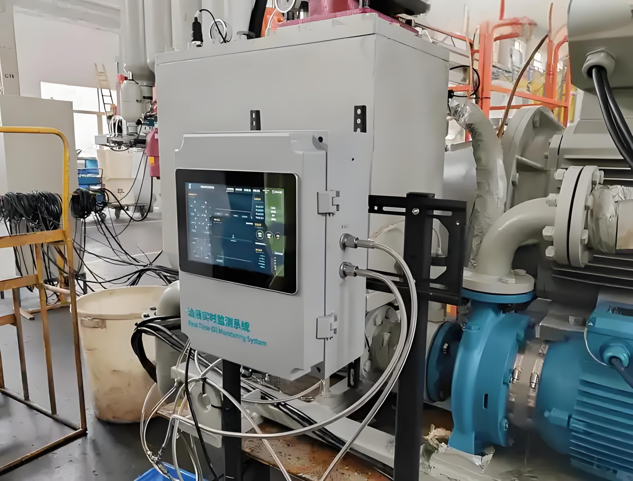 Hydraulic system troubleshooting site with technician using instruments for detection