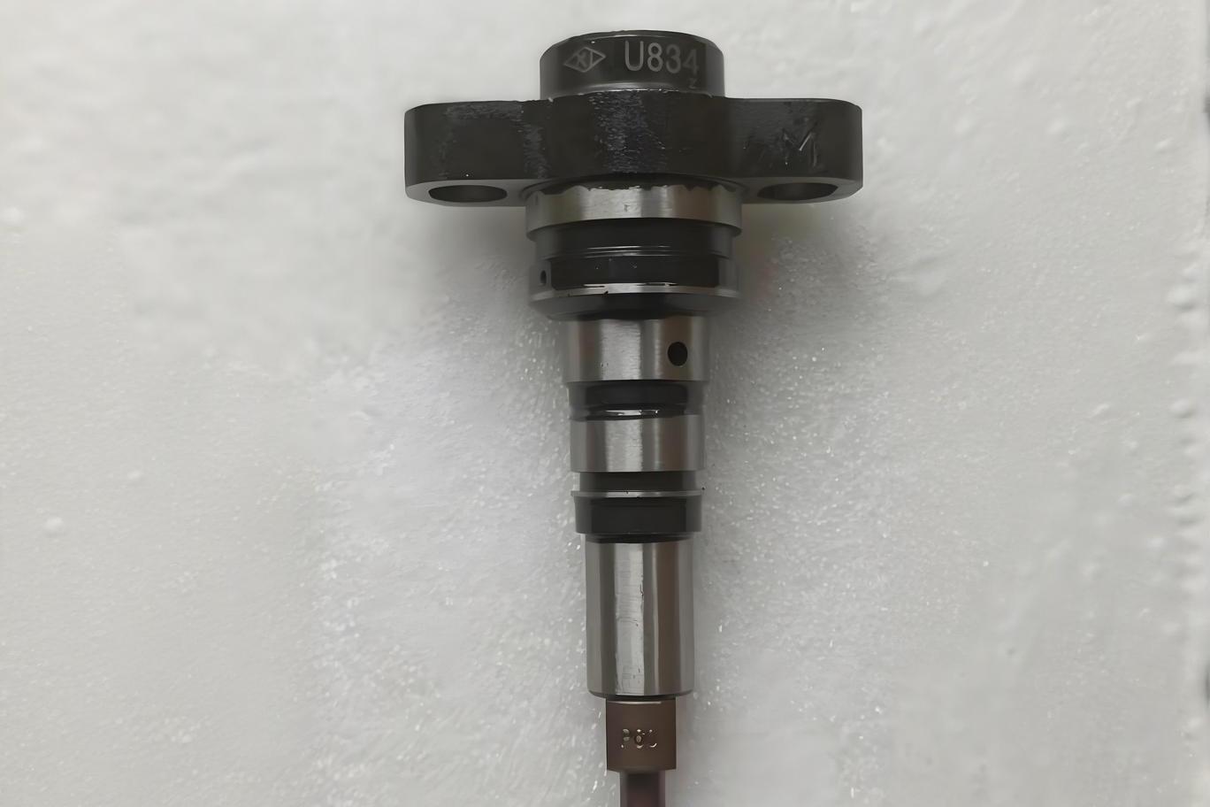 Hydraulic pump plungers and cylinders showing precision machined surfaces